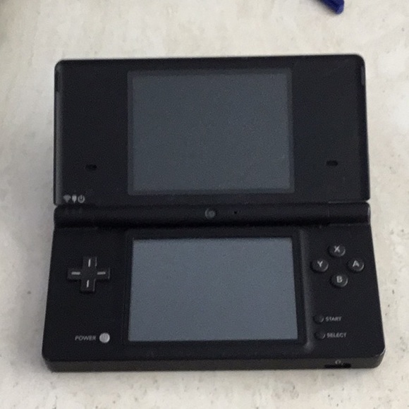 Nintendo DSi Console & 6 Nintendo DS Games Handheld System & Charger Toy Story - Picture 3 of 16